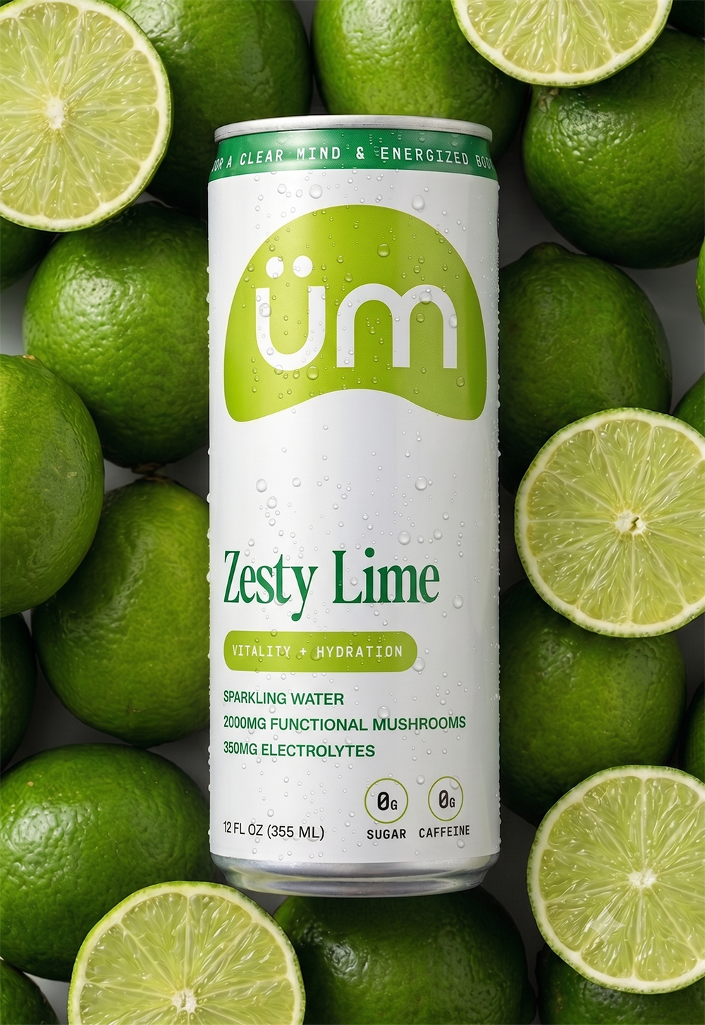 Can of Zesty Lime üm on pile of limes.